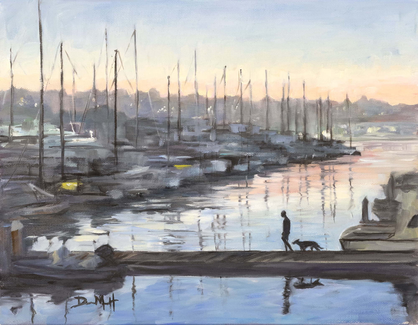 Sun setting behind boats in harbor at yacht club. Man and dog on pier.