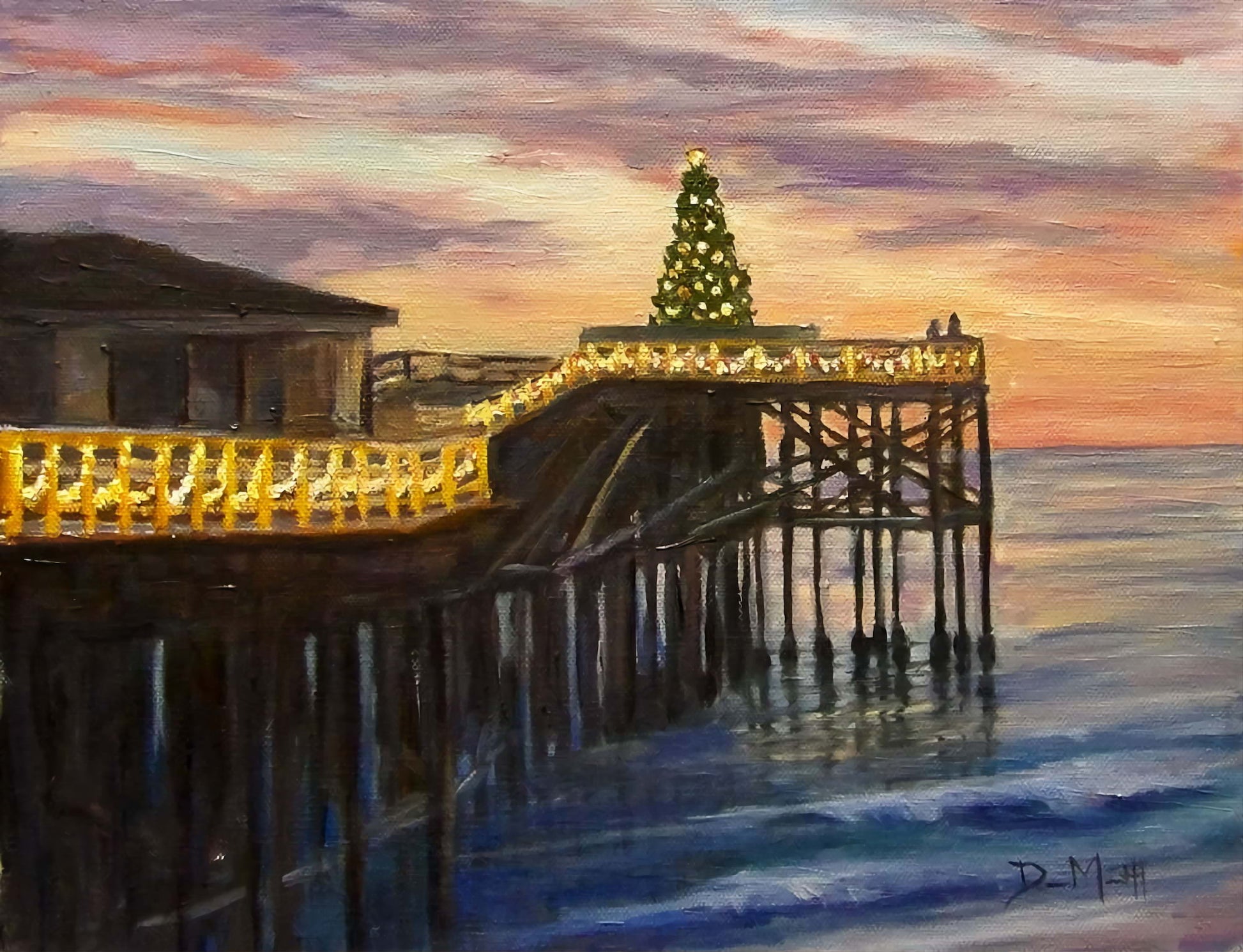 Christmas tree and lights on ocean pier.  Breaking waves and sunset and clouds.