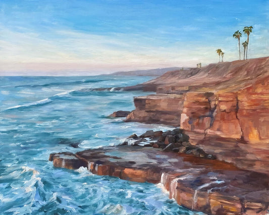 Reddish beach cliffs and turquoise ocean, Sunset Cliffs, San Diego.